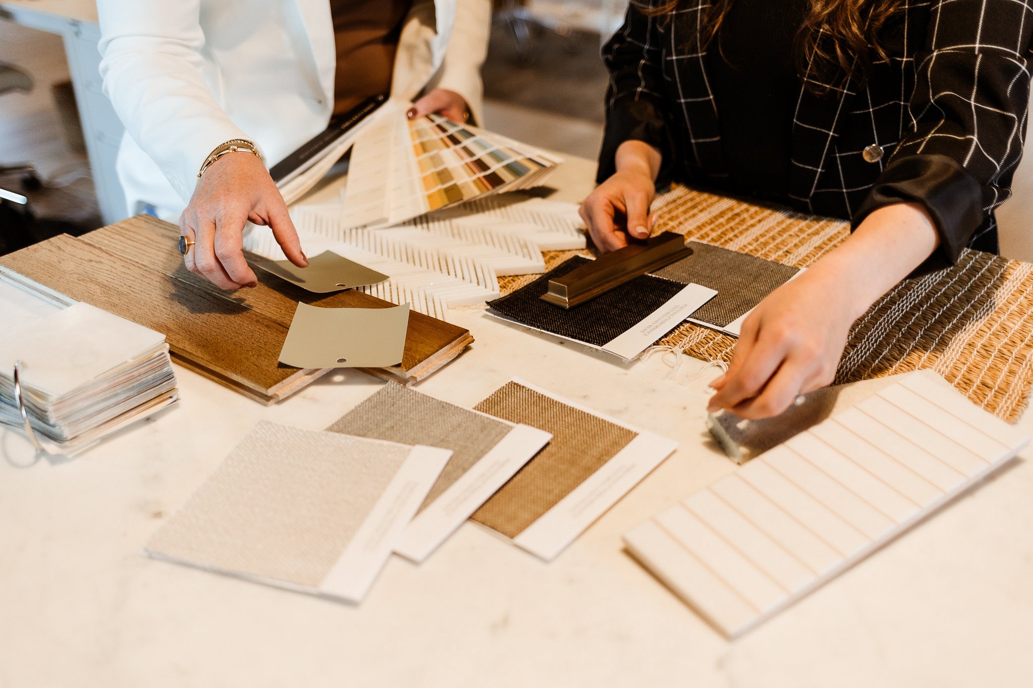Pacific Palisades, California interior designers selecting colors, materials and styles for their clients.