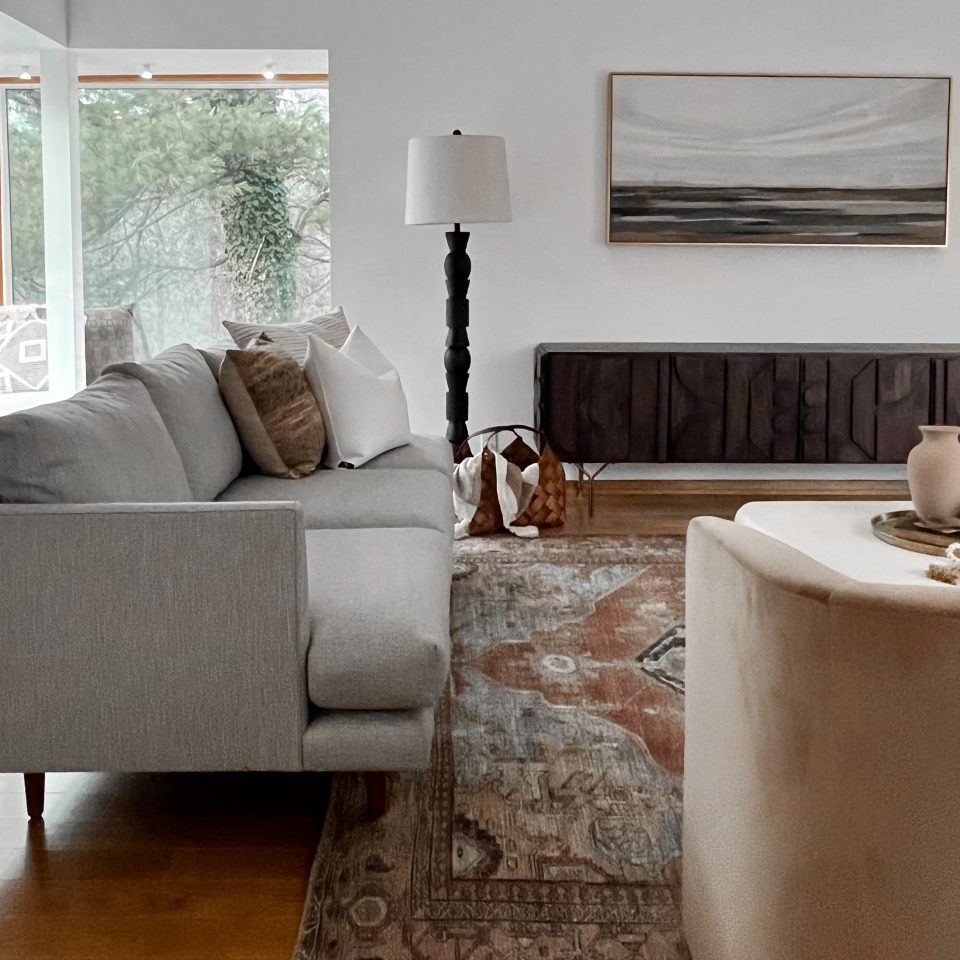 Mid century modern decor in Pacific Palisades, California home creates unique shapes and lines in a living room